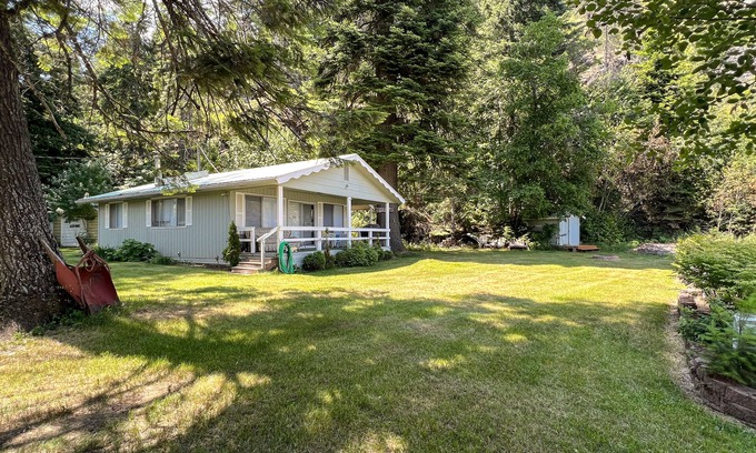 Rathdrum House | Lakefront home with private dock, large yard, wood stove, firepit, grill, W/D