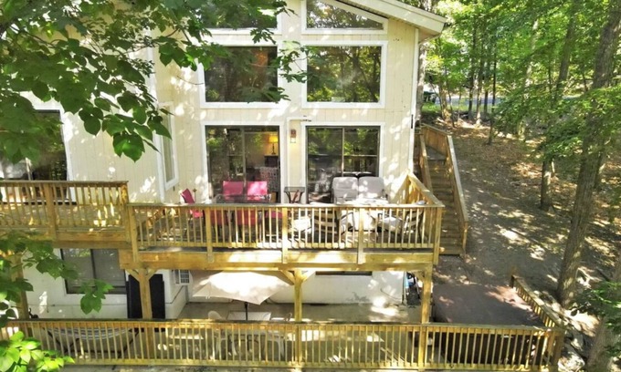 East Stroudsburg House | Lakefront with Kayaks, Canoe, Wood-Burning Fireplace, Pool, Hot Tub, and FirePit