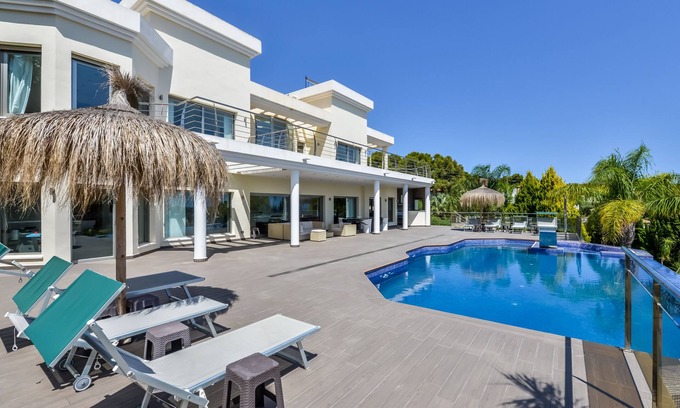 Urbanitzacio la Fustera Villa | Large modern villa with indoor and outdoor pool sauna and bar.