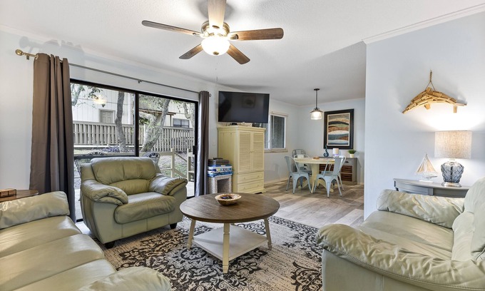 Fernandina Beach House | Latitude Adjustment-One block from the beach, shared pool, one dog allowed.