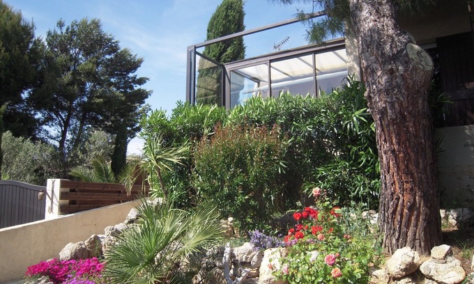 Leucate House | Leucate Beach: house with garden on the cliff, pond and Canigou view