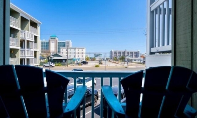 Carolina Beach Condo | Life's a Beach - walk to everything in historic Carolina Beach! by RedAwning