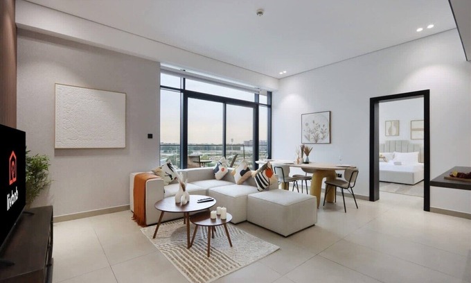 Dubai Production City Apartment | Livbnb-Stylish and Spacious 1B w/Private Balcony