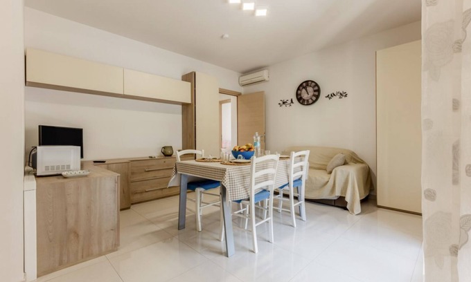Is Mirrionis Apartment | Located in a quiet area of ​Cagliari, the apartment offers a welcoming accommodation ideal for those who want comfort and relaxation. With a surface area of ​60 sqm, it is located on the first floor served by a lift and can accommodate up to 4