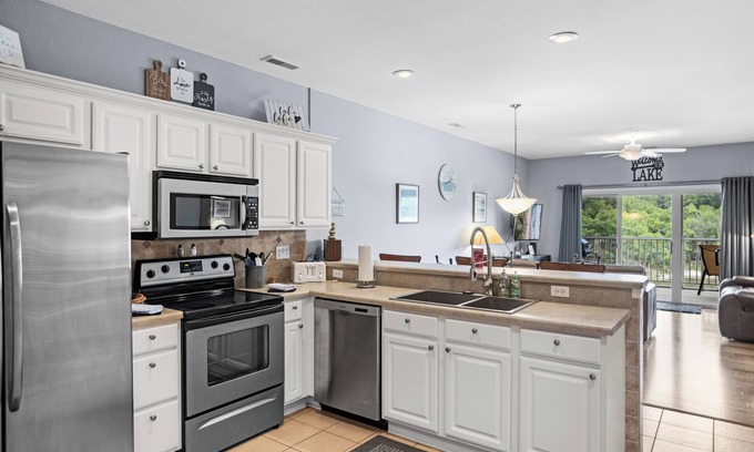 Camdenton Condo | Loch Haven 138-6E - Serene Views from the Screened Deck!