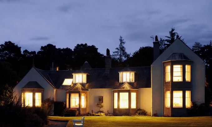 Elgin Cabin | Lochside Luxury: Historic Home with Stunning Scottish Woodland Views