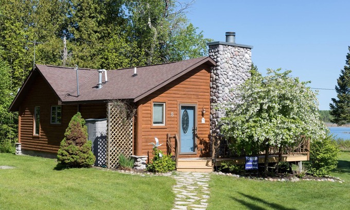 Indian River Cabin | Log Cabin on the Canal of the Indian River between Burt Lake and Mullet Lake!