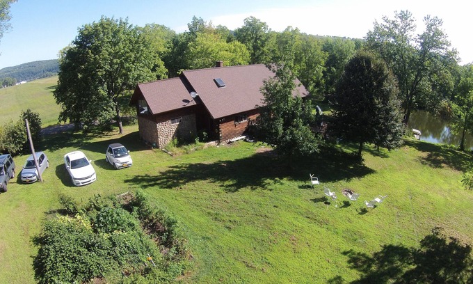 Tunkhannock House | Log House on water, family get-a-way in mountains w/pond, fishing & Swimming