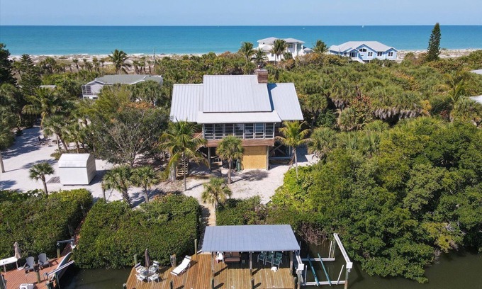 Palm Island House | Loggerhead Landing: Beach, swim spa and dock: This lodge on the beach has it all!