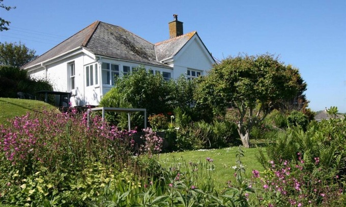Portmellon Cottage | Longships, looks across the cove of Portmellon
