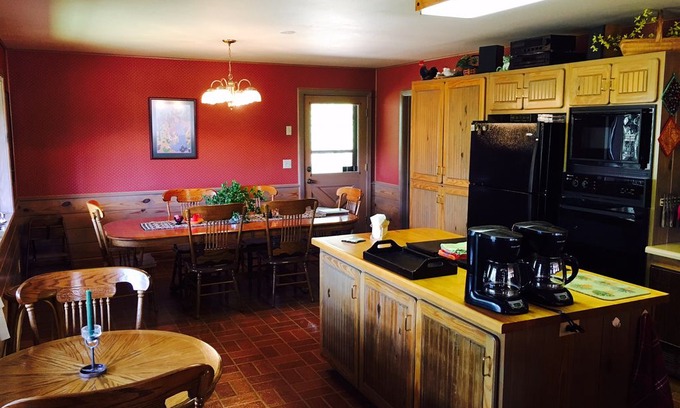 Mancos Cabin | Lost Canyon Lake Lodge is a magnificent 2-story log house nestled in the pines.