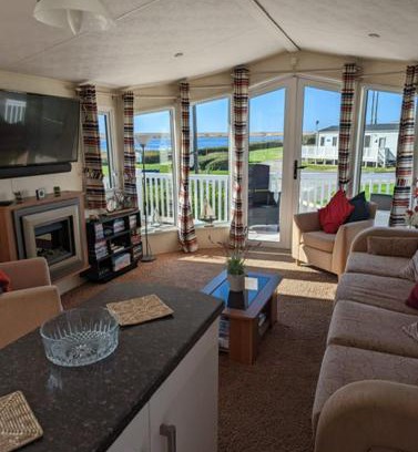 Weymouth Resort | Lovely and Bright Caravan Haven Littlesea with views across the Fleet Lagoon