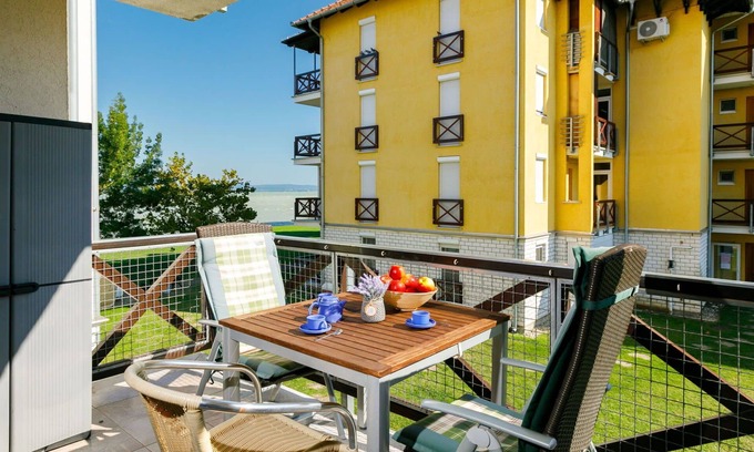Balatonoszod Apartment | Lovely apartment for 4 guests with WIFI, A/C, TV, balcony and parking