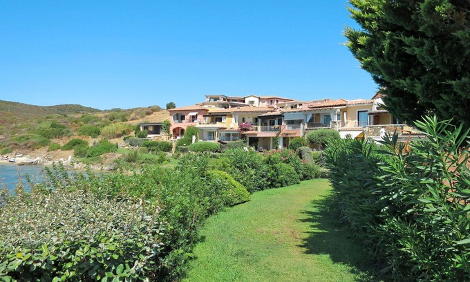 Baia Caddinas Apartment | Lovely apartment for 6 guests with WIFI, pool, A/C, TV, terrace and pets allowed