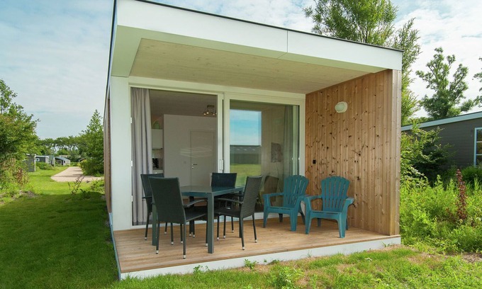 Sint Maartensvlotbrug Ski Chalet | Lovely chalet with covered terrace, close to the North Sea