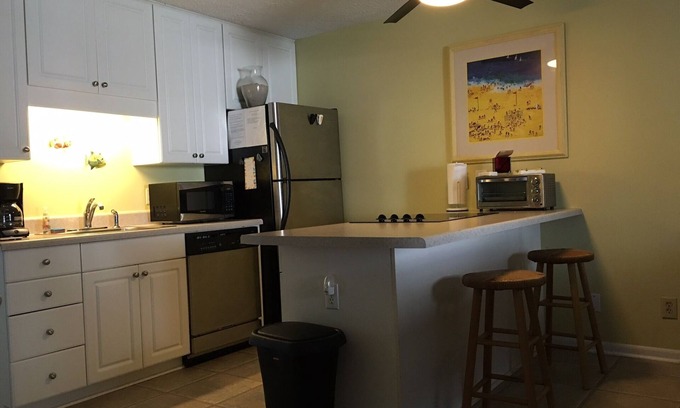 Carolina Beach Condo | Lovely Condo steps from beach, pool, Carolina Lake View, Walk to everything