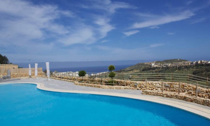 Xaghra Apartment | Lovely home with beautiful view with communal pool