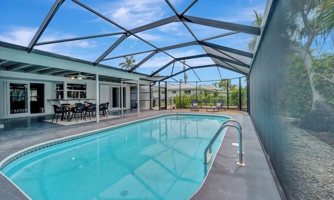 Iona Shores Villa | Luxe Paradise Escape on a Canal!