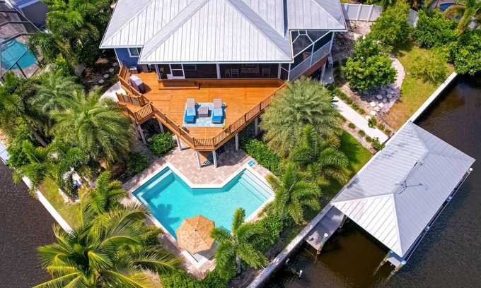 Saint James City House | Luxurious waterfront home, pool, boat dock, fillet station, private guest suite