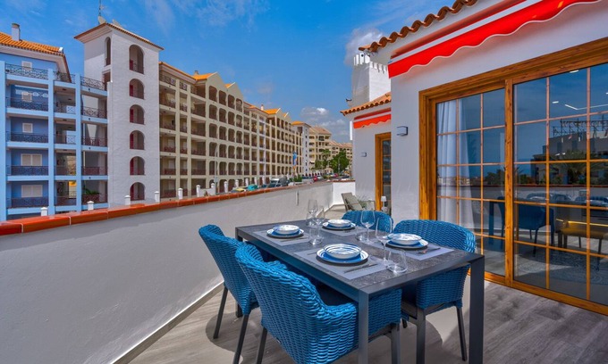 Los Cristianos Apartment | luxuriously renovated 2 bedroom, 2 bathroom, hugh terrace, heated pool and WIFI