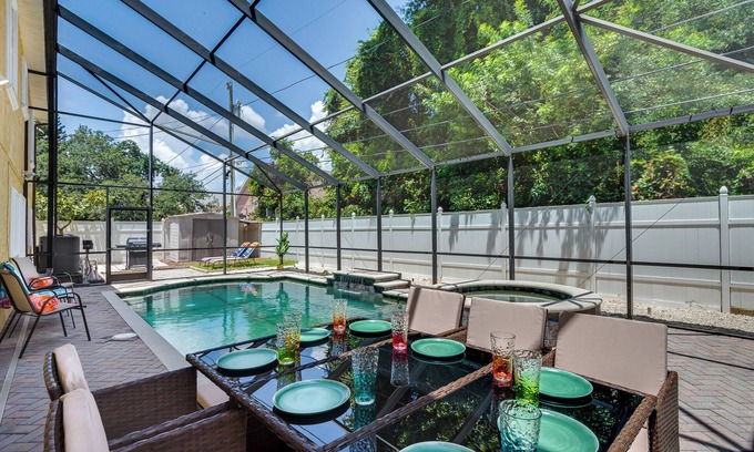 Dunedin House | Luxury 5 Bedroom Dunedin home ~ TWO full kitchens, heated pool, hot tub!