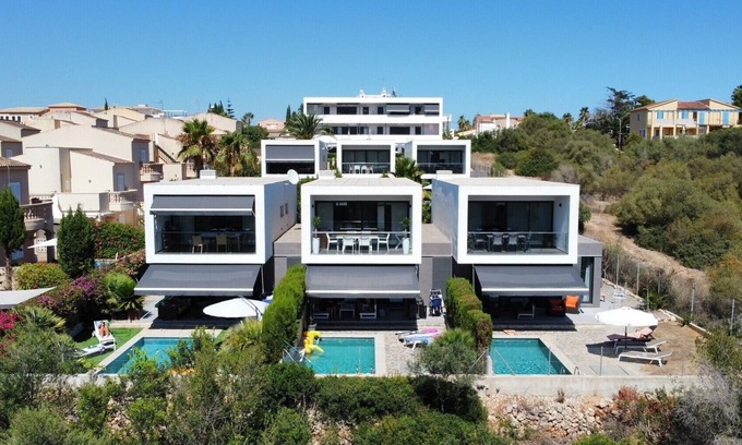 Cala Mandia Ski Chalet | Luxury chalet, new high-quality furnishings, fiberglass, pool, distant view, close to the beach