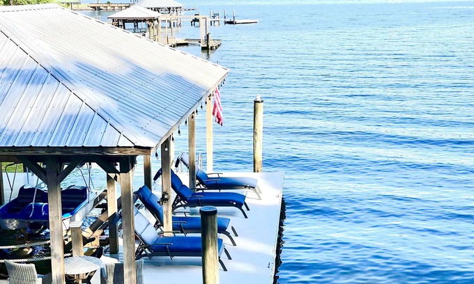Terrell House | Luxury lakefront home with a covered private dock & large game room