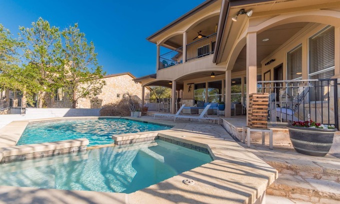 Paleface Park House | Luxury Lake Travis Waterfront River Retreat: Heated pool, yard, pool table