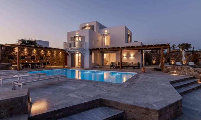 Psarou Villa | Luxury Peninsula Villa with Garden of Olive Trees