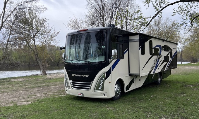 Walker House | Luxury RV with Bunkbeds Stationed on serene Grand River with private golf course