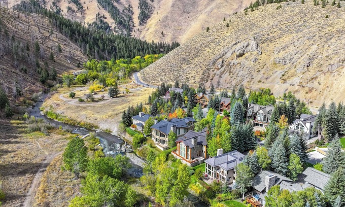 Warm Springs House | Luxury Warm Springs Retreat: Riverfront, Hot Tub, & Steps to Lifts