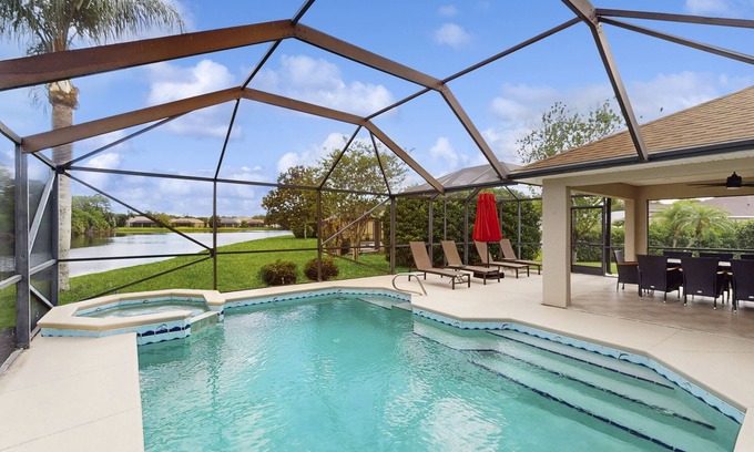 Melbourne House | Luxury waterfront home with private pool, hot tub, patio and WIFI