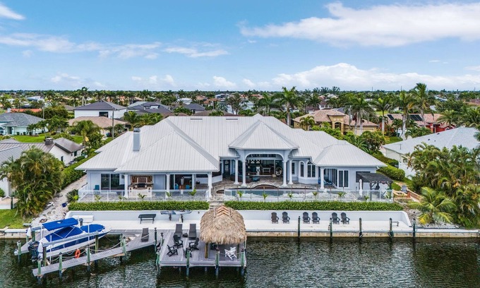 Pelican House | Luxury Waterfront Resort-Style Home in SW Cape Coral. nON-SITE recreation! NEW