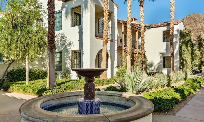 La Quinta Villa | LV100 Upstairs 1 Bedroom Legacy Villas Retreat Overlooking a Community Fountain!