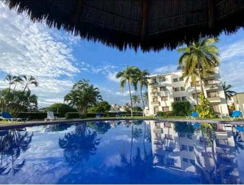 Manzanillo Apartment | Magnifico Departamento, cocina equipada, 2 Recamaras 2 Baños , hasta 6 Personas, 3 albercas, playa a 50 mts wifi, aire acondicionado