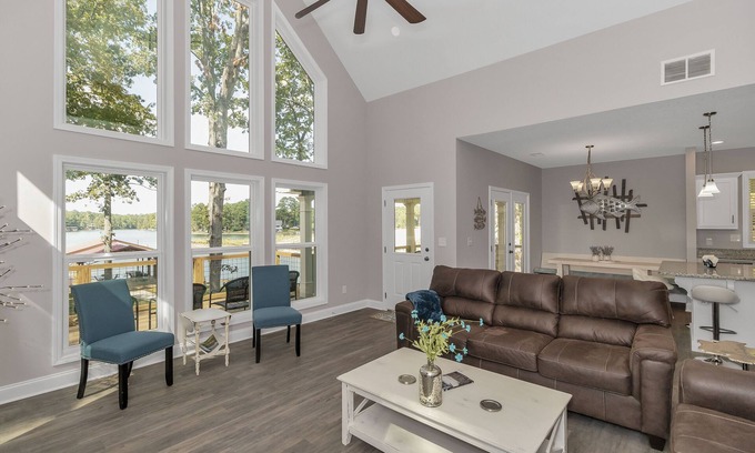Dadeville House | Majestic Lakefront Home Awesome boathouse, Sandy beach, Decks, Amenities galore!