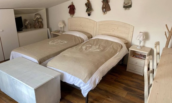 Conco Apartment | Mansarda Le Laite by Ca-Sa Check