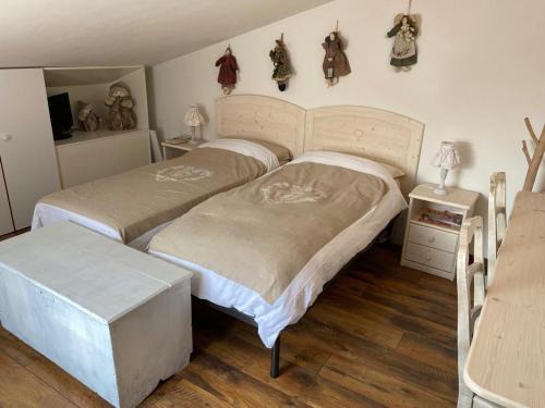 Conco Apartment | Mansarda Le Laite by Ca-Sa Check