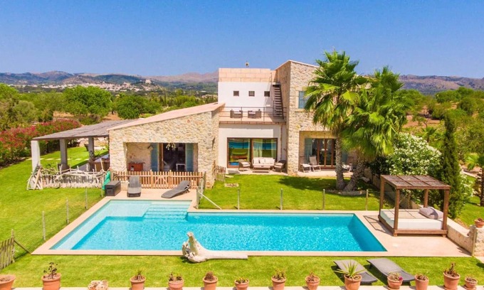 Arta Villa | Maritime garden with a stylish interior.