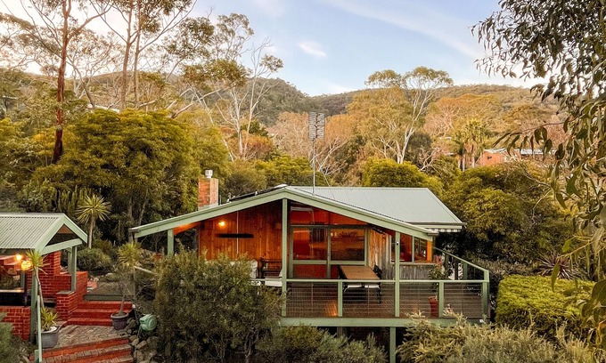 McCrae House | Mid century modern style home with pool and sauna. Pet friendly!