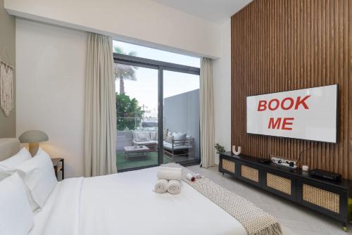 Jumeirah Village Circle Apartment | Minimalist Studio With Nature-Inspired Balcony in JVC