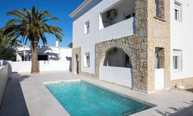 Cala Blanca Apartment | Modern Apartment "Marei 2" with Private Rooftop Terrace, Pool, Air Conditioning and Wi-Fi