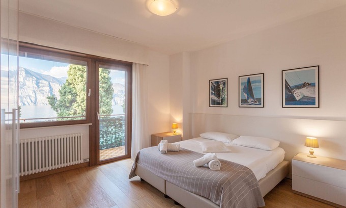 Cassone Apartment | Modern Apartment "Gennaker" On Lakeside with Terrace and View