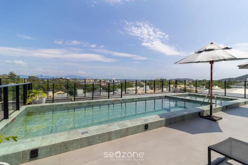 Cachoeira do Bom Jesus Apartment | Modern Apartment Near the Beach! - ATC0301