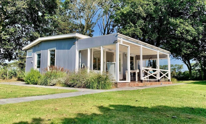 Sint Maartensvlotbrug House | Modern bungalow with veranda, 2 bedrooms, sleeps 4, WiFi, lovely large enclosed garden, dog welcome