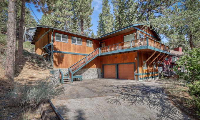 Zephyr Cove Cabin | Modern cabin with fireplace, spacious deck, & beautiful forest views, sleeps 6