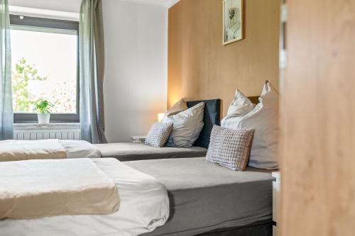 Tuddern Apartment | Modern House "Brick Lane" with Terrace and Wintergarden - LOFTIGO