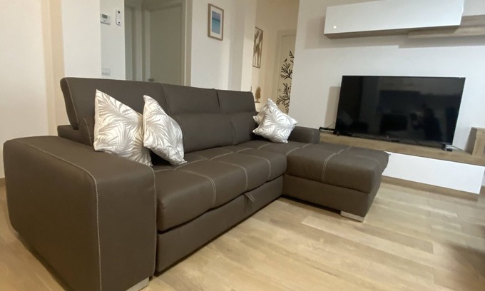 Viareggio Apartment | Modern sunny apartment within minutes from shops &beach with parking for 2 cars