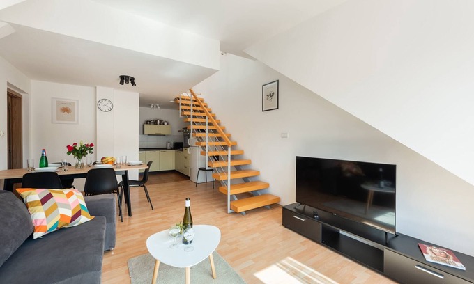 Smichov Apartment | Modern two-level apartment with balcony