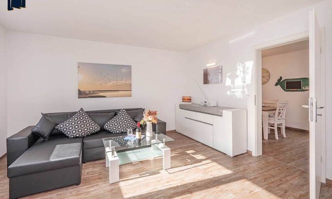 Kamminke Apartment | Modern vacation apartment by the lake with terrace and garden view on Usedom